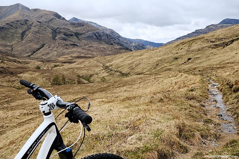 cycling into glen nevis on a mountain bike
